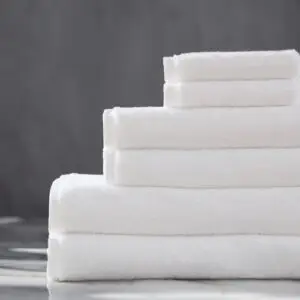 100% Egyptian cotton towels folded on a table