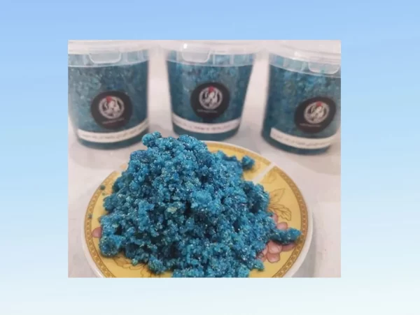 Original Moroccan Blue Nile scrub with Iranian Sea Salt sand displayed on a plate