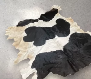 Authentic Egyptian Cowhide Rug in Black, White, and Dust of Brown
