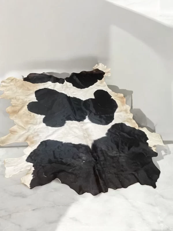 Authentic Egyptian Cowhide Rug in Black, White, and Dust of Brown - Image 2