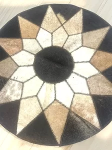 Elegant Round Cowhide Placemat with Geometric Starburst – 21" Diameter