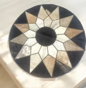Elegant Round Cowhide Placemat with Geometric Starburst – 21" Diameter