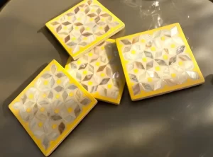 Modern Mother-of-Pearl Mosaic Coasters with Yellow Accents – Set of 4
