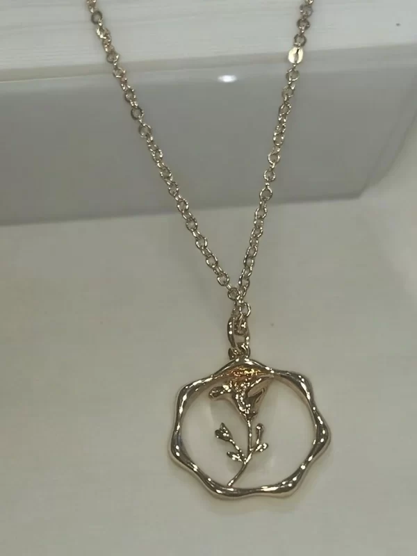 Gold Floral Pendant Necklace with Minimalistic Design - Image 2