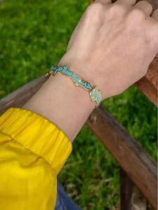 Gold-Toned Arabic Motivational Cuff Bracelet with Blue Enamel